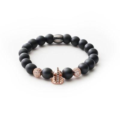 Onyx beaded bracelet with a rose gold Spartan charm.