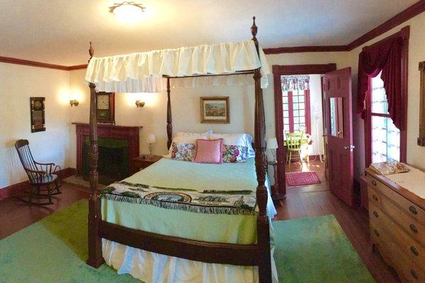 The Golding Room offers the ideal getaway with a queen-size canopy bed, fireplace, private bath with shower, free wifi, desk, tv, and AC.