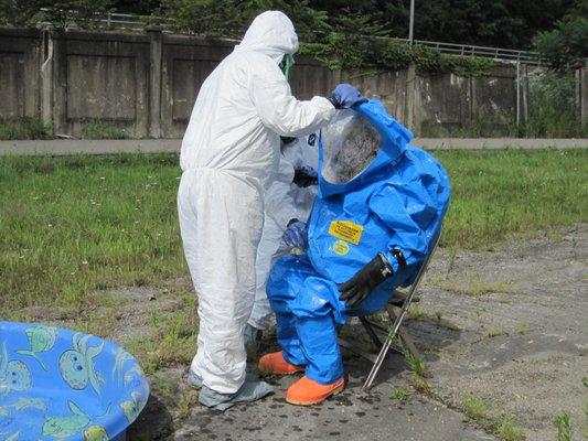 Hazwoper training: suit removal during decontamination sequence, 2019