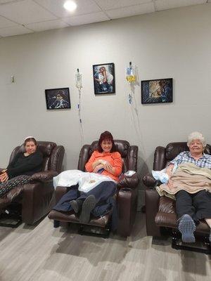 Relaxing and getting defense against long haul viruses by supporting the immune system! Lady on the left had completed her infusion.