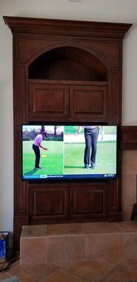 Opening in cabinet was not large enough for TV so we  floated the TV in front of the cabinet.