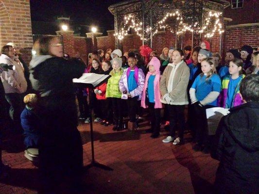 Jefferson City Childrens Choir performs at the CCHS for the annual Living Windows holiday event.