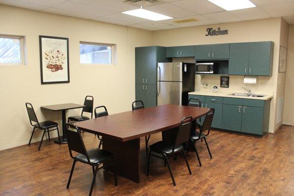 Kitchen/Break Room with refrigerator, coffee maker and sink.