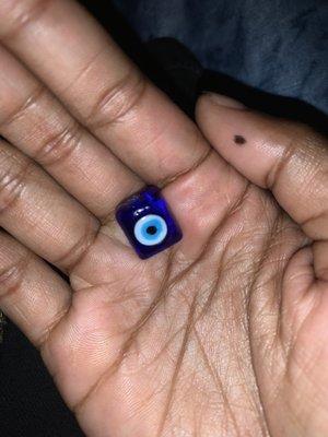 mal de ojo bead/token given for protection