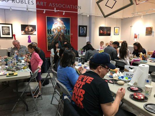 PRAA Veterans Rock Painting Party in collaboration with Veterans Outreach inside the Showroom Gallery.