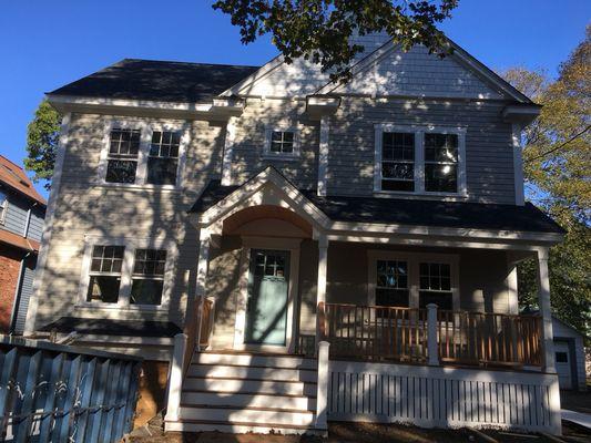 After Farmhouse style colonial conversion from cape style.