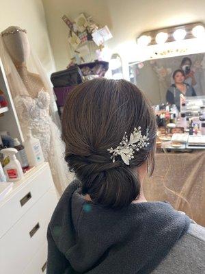 Low side bun with hair piece