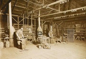 Rasmus and his blacksmith shop. Circa early 1900s.