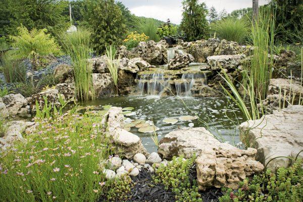 This 10' x 10' pond was created using Weathered Limestone boulders and ledgerock.  Aquatic plantings highlight the natural appearance!