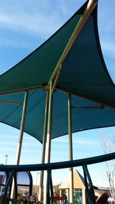 Coverings all over the play structure provide shade