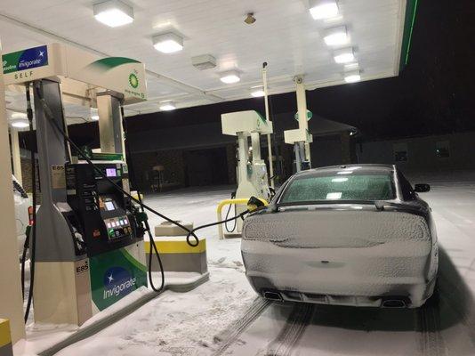 Just getting some fuel with my car caked in snow. Nothing to see here.