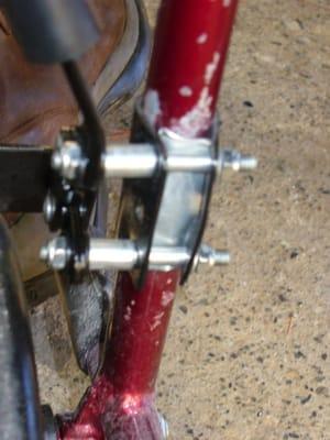 tighten the brakes the frame is bending it looks like they used a shim when Owens Health Care assembled brake to frame