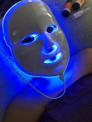 LED light therapy to treat acne.