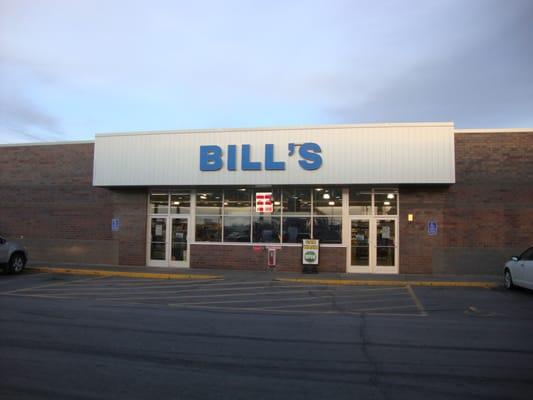 Front of building, facing west.