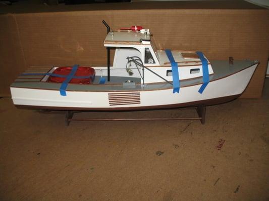 Hand built wooden model fishing boat