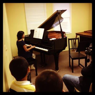 Piano student performing in our Saturday Concert Series.