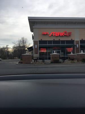 Outdoor seating and parking area