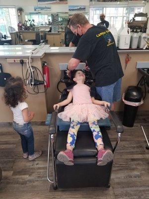 My 5yr getting a haircut.