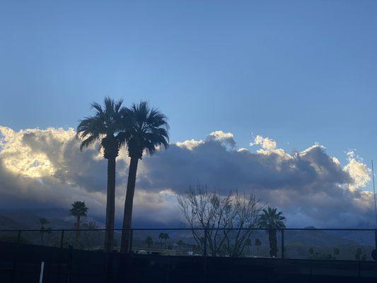 Views of sunset from a tennis  court