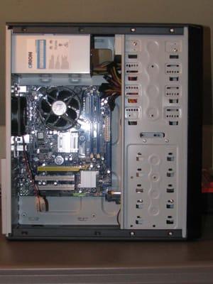 The Power Supply in this case is installed in the upper left hand Corner