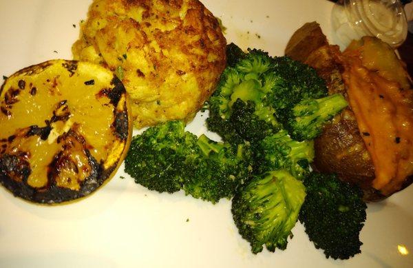 The single crab cake entree with a load baked potato and broccoli