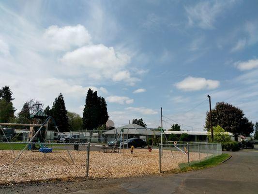 Park's owners put in a playground, basketball hoop, more parking & a full sized soccer field for residents