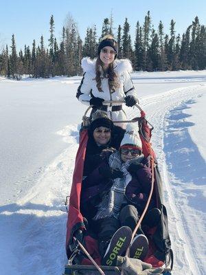 Girls having fun with the doggies and ride