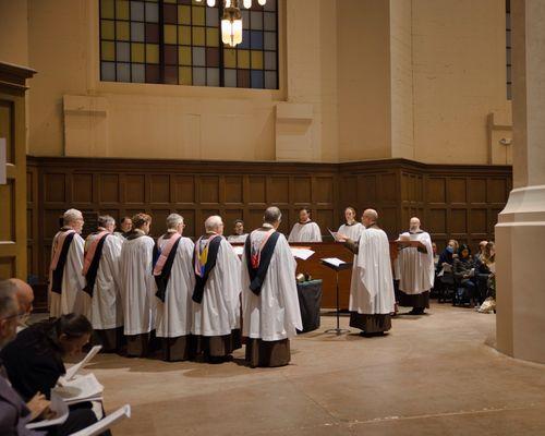 The Compline Choir singing at a recent Advent Procession service.