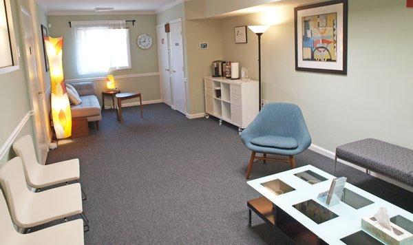 Comfortable waiting area with coffee and tea bar.