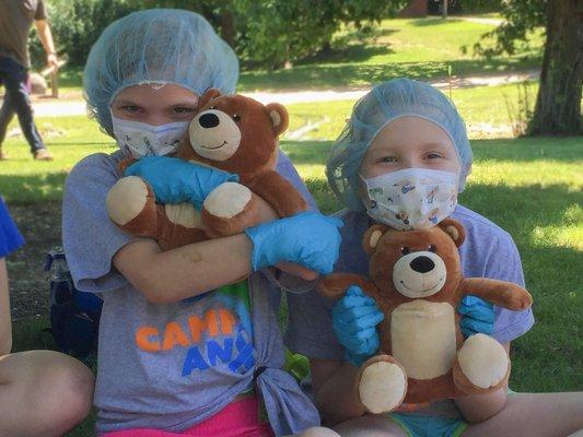 Two campers smile for the camera after an afternoon session of Medical Play.