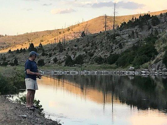 Guest fishing in pond