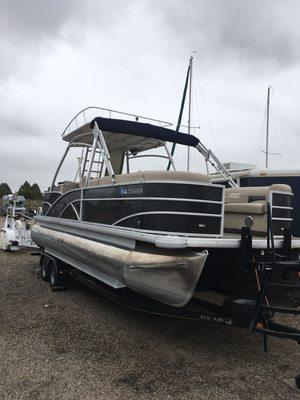 27' Godfrey party pontoon, 14 person capacity equipped with bar, grill and water slide. Captain available but not required!