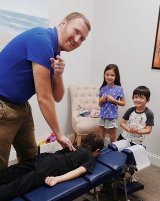 These kiddos love getting adjusted and we love adjusting them! Kids get adjusted for free with an adult appointment!