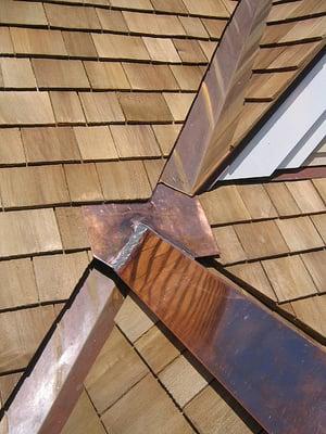 Shingle roofs are a specialty.