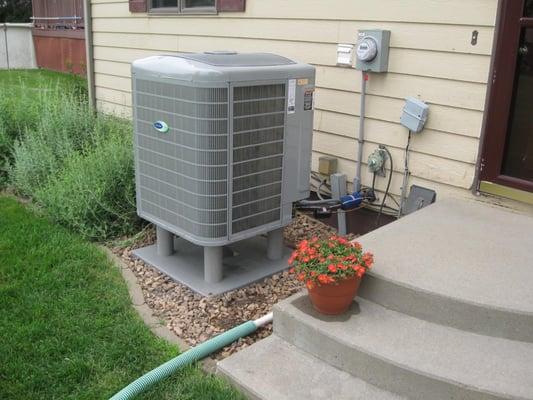 Installed outside, this unit is providing heating and air condoning in a 3 story home that has 3660 square feet for $702.00 f...