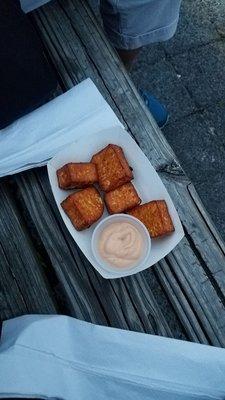 Perfectly cooked fried cheese bites.