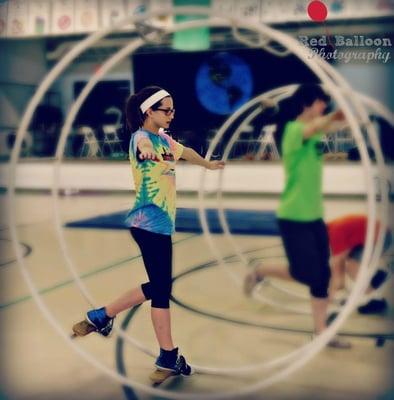 German Wheel or Cyr Wheel. Classes for adults, teens, youth in Intro and Intermediate levels available.