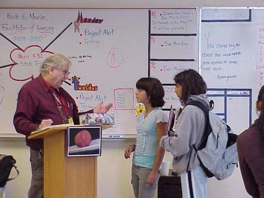 Brian teaching a science class about hypnotherapy at a local High School