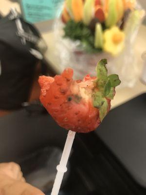 One of the strawberries my coworker accidentally bit into before realizing the mold. Others had white and green splotches.