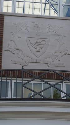 Inscription on the Upper School exterior.