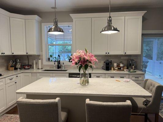 Nice inland with beautiful pendant light and quartz countertop.