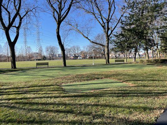 You can practice your golf swing at the park; the five-hole putting green is also seen here.