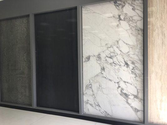 Slabs available in an array of designs and colors. Marble, travertine and onyx porcelain looks come in 5x10 ft slabs.