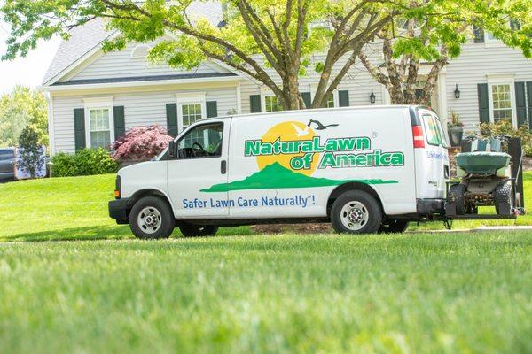 A NaturaLawn of America service van.