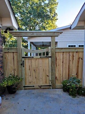 Custom bult to order gate frame in addition to picture frame fencing around yard.