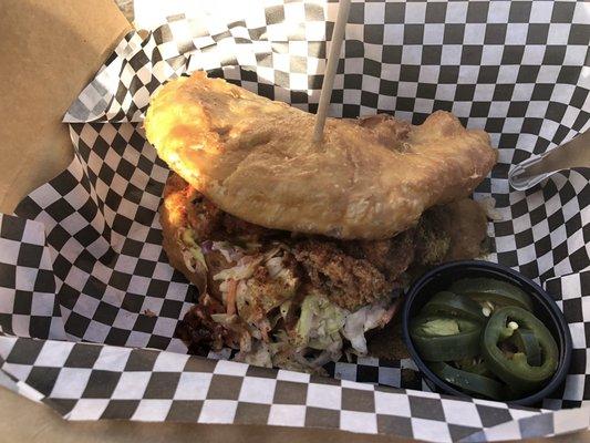 Fried chicken sandwich on fry bread.