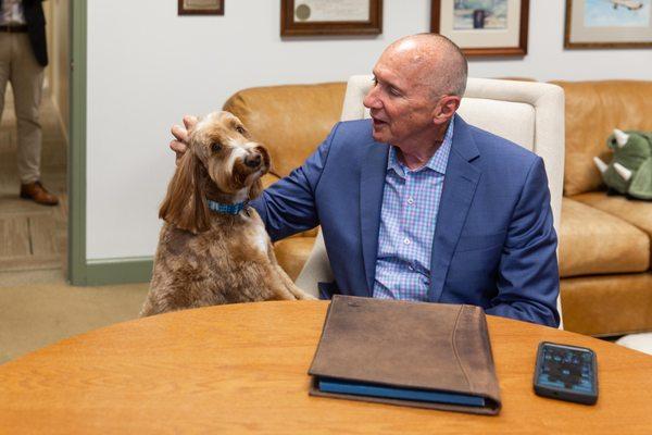 Bruce Kehoe with WKW office pup, Auggie Kehoe