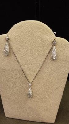 Diamond drop matching earings and necklace.