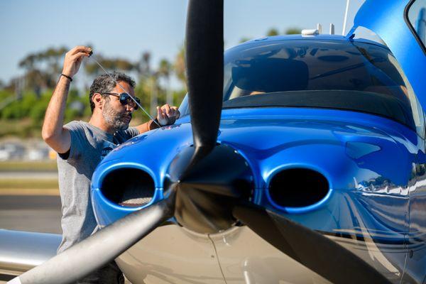 One of our students conducting a pre-flight check.