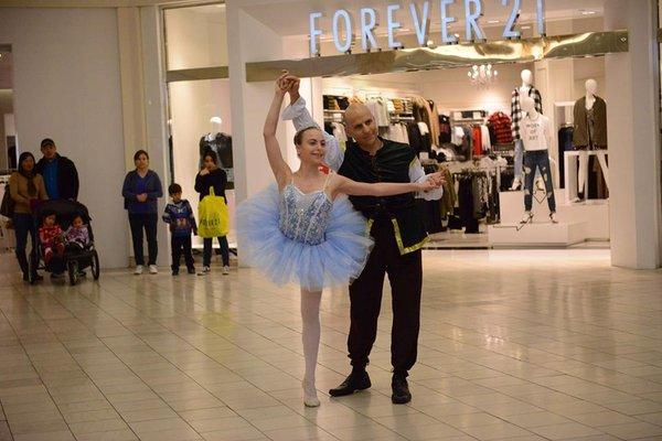 Father and daughter dancing together for the first time "Pas de deux" at Hillsdale Mall.